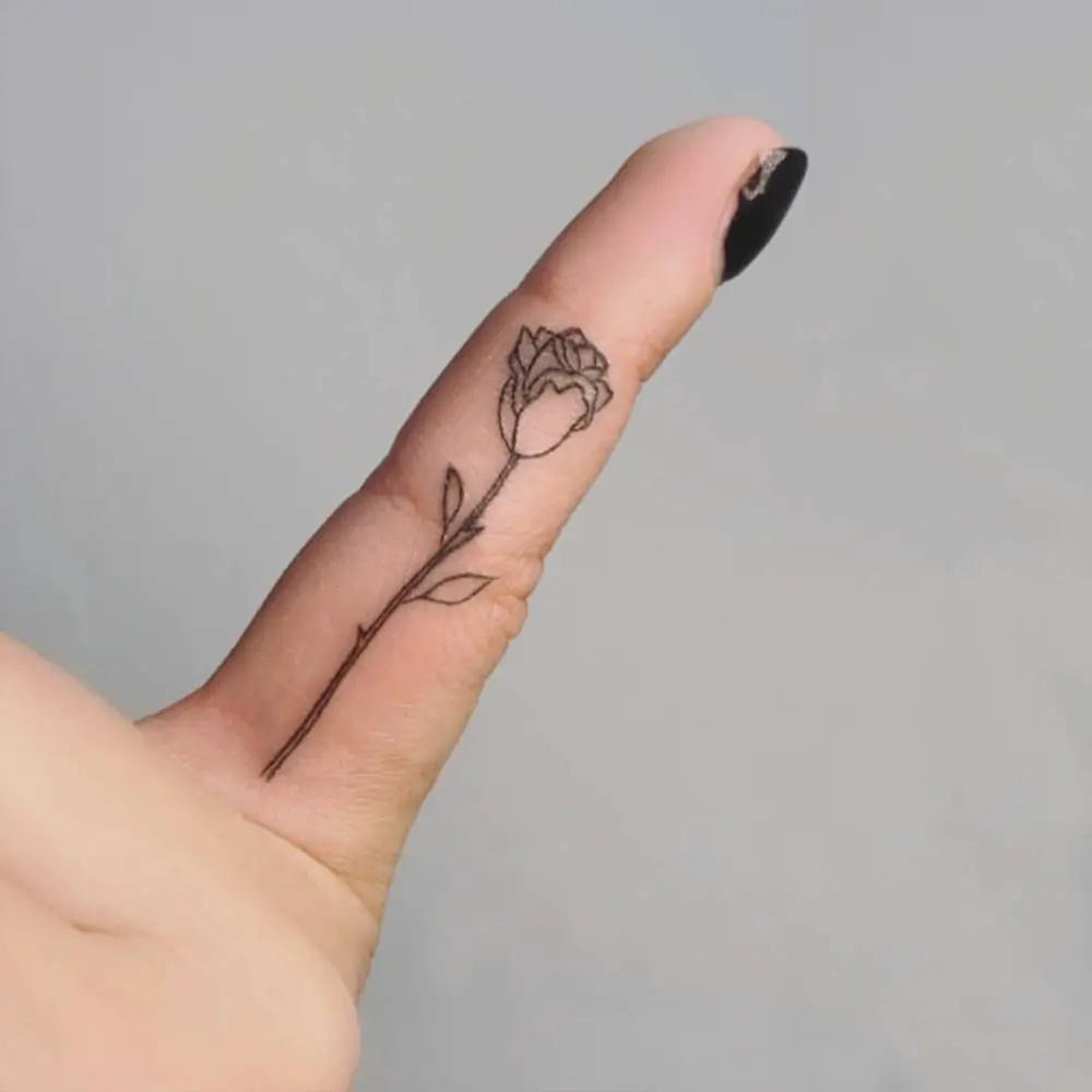 rose flower finger tattoo