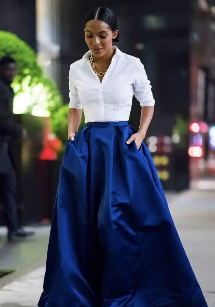 Yara shahidi in a full length blue silk skirt 