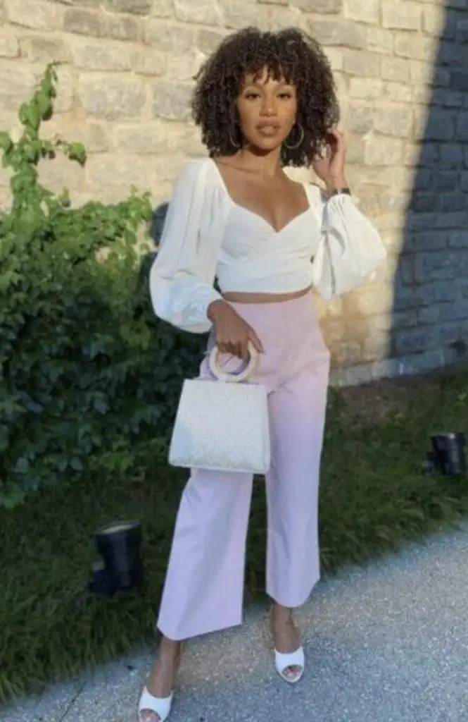 Pink gaucho pants with a white wrap top