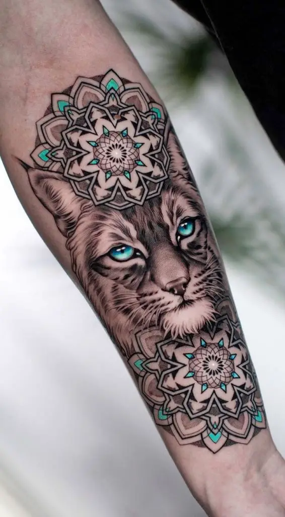 half cat, half mandala tattoo art