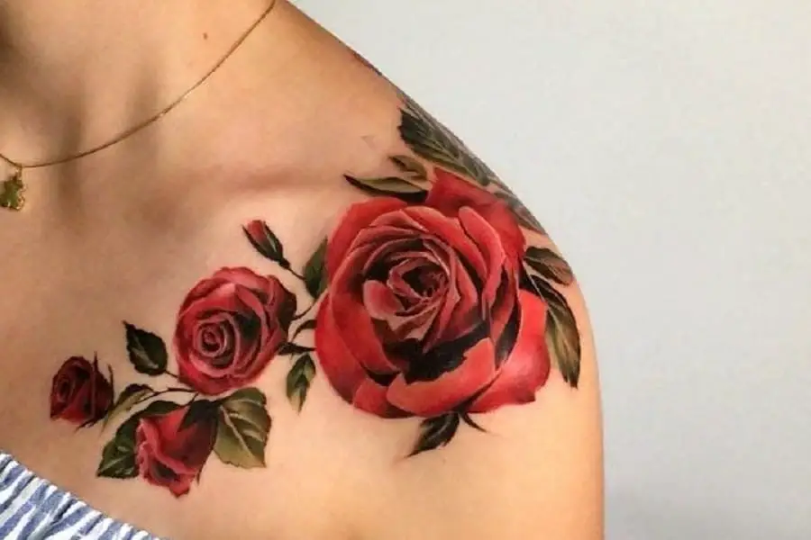 red rose tattoos on the shoulders