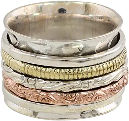 Novica 925 sterling silver, copper and Brass spinner ring 