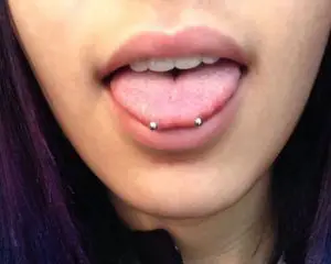 the classic snakes eye piercing