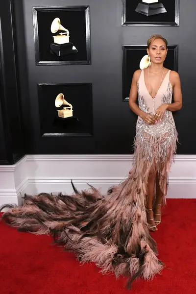 Jada in fish tail feathered dress