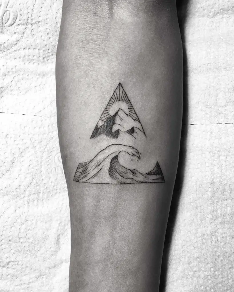 Mountain and wave tattoo