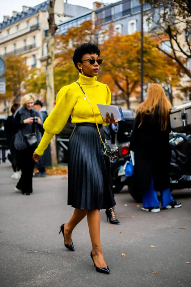 black midi skirt with yellow turtle neck top