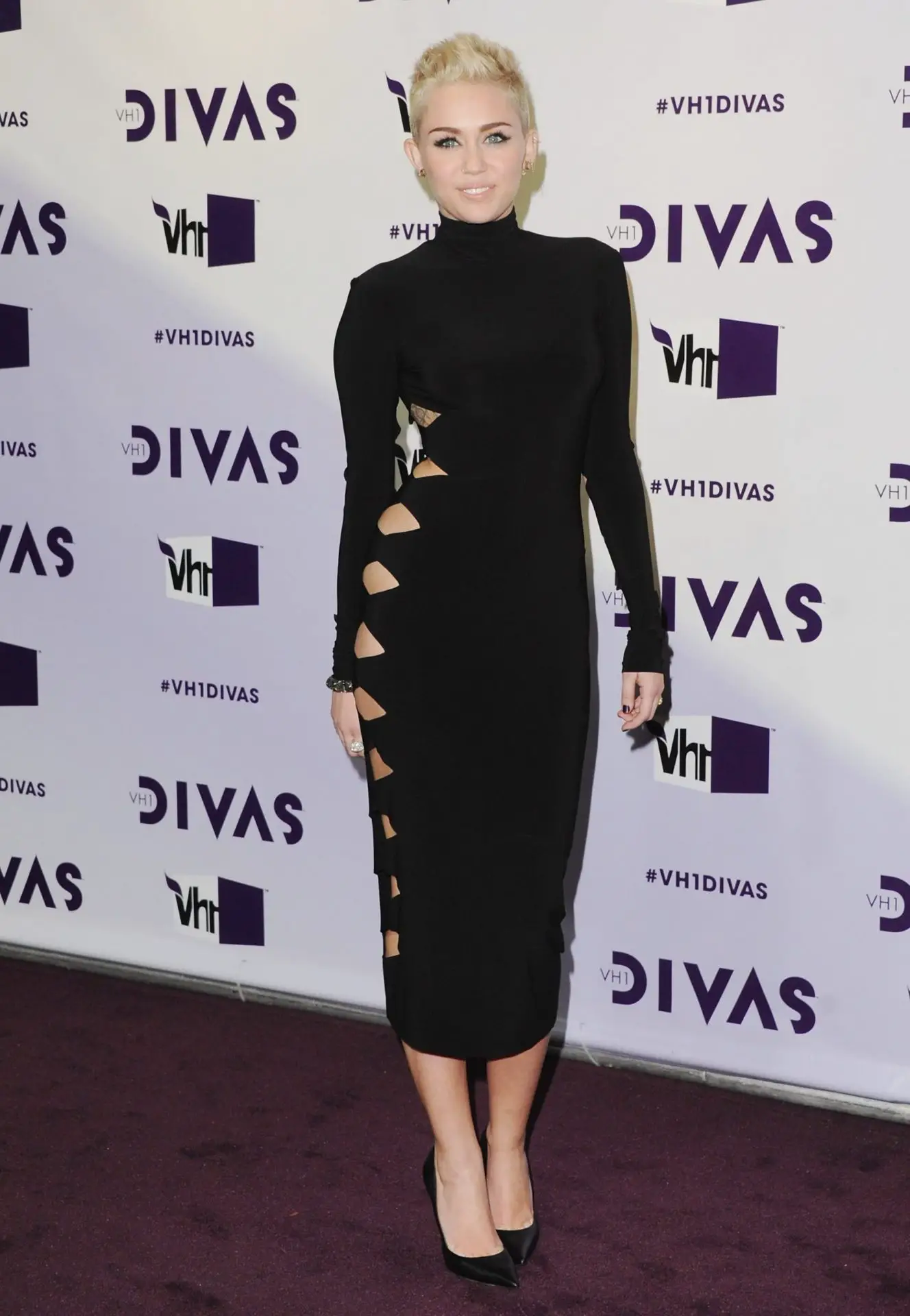 Miley Cyrus black turtleneck dress