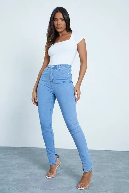 light wash split hem skinny jeans