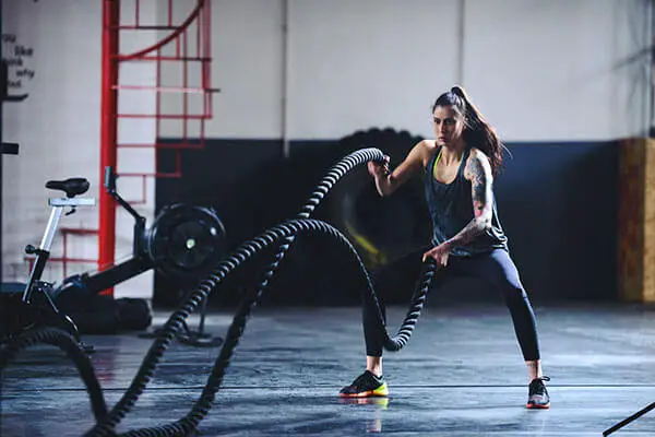 Battle ropes for smaller waist workout